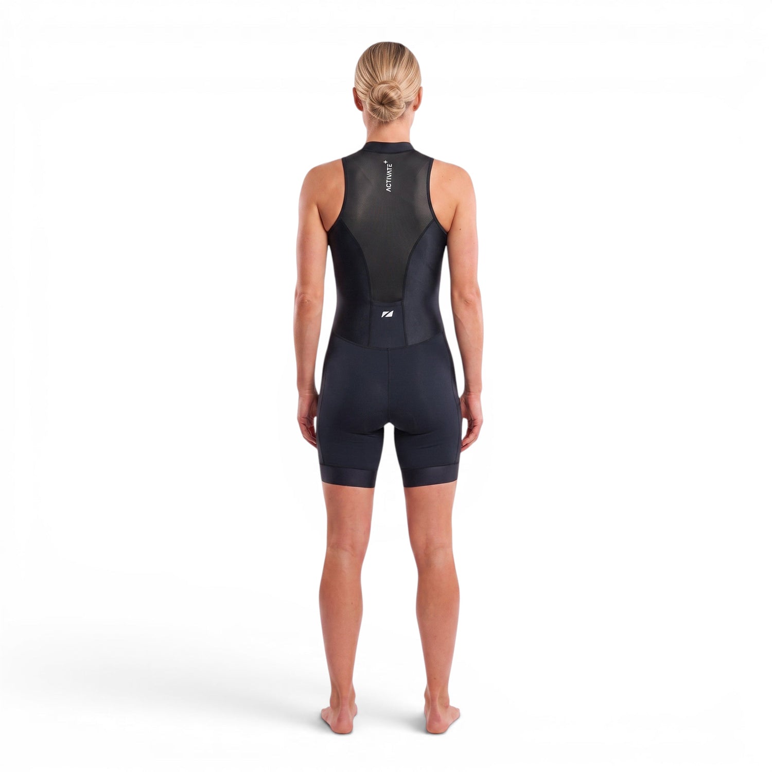 athlete wearing the Women's Activate Sleeveless Trisuit in black, back facing on a white studio setting. 