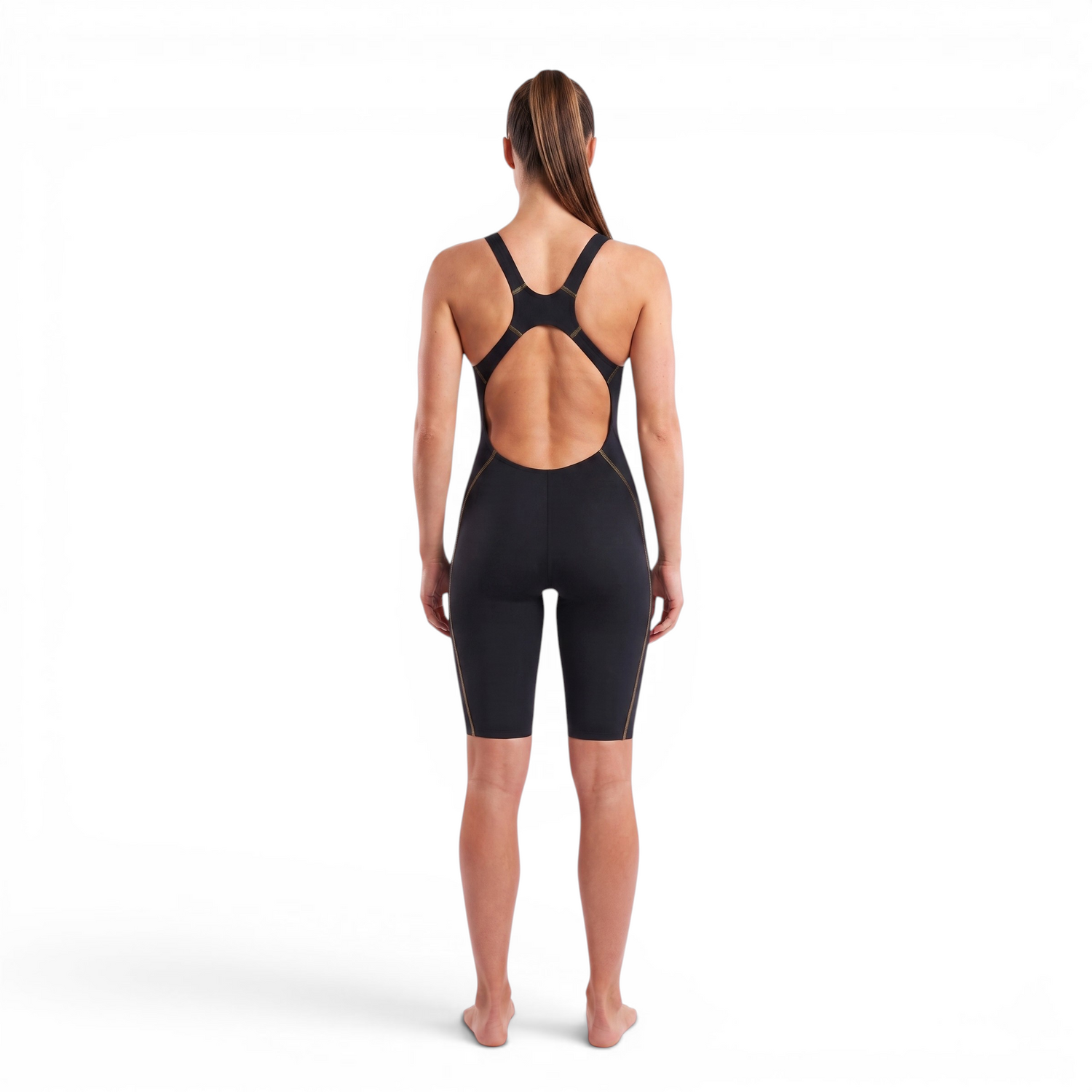 A woman wearing the Zone3 MF-X Performance Gold FINA kneeskin on a white background.
