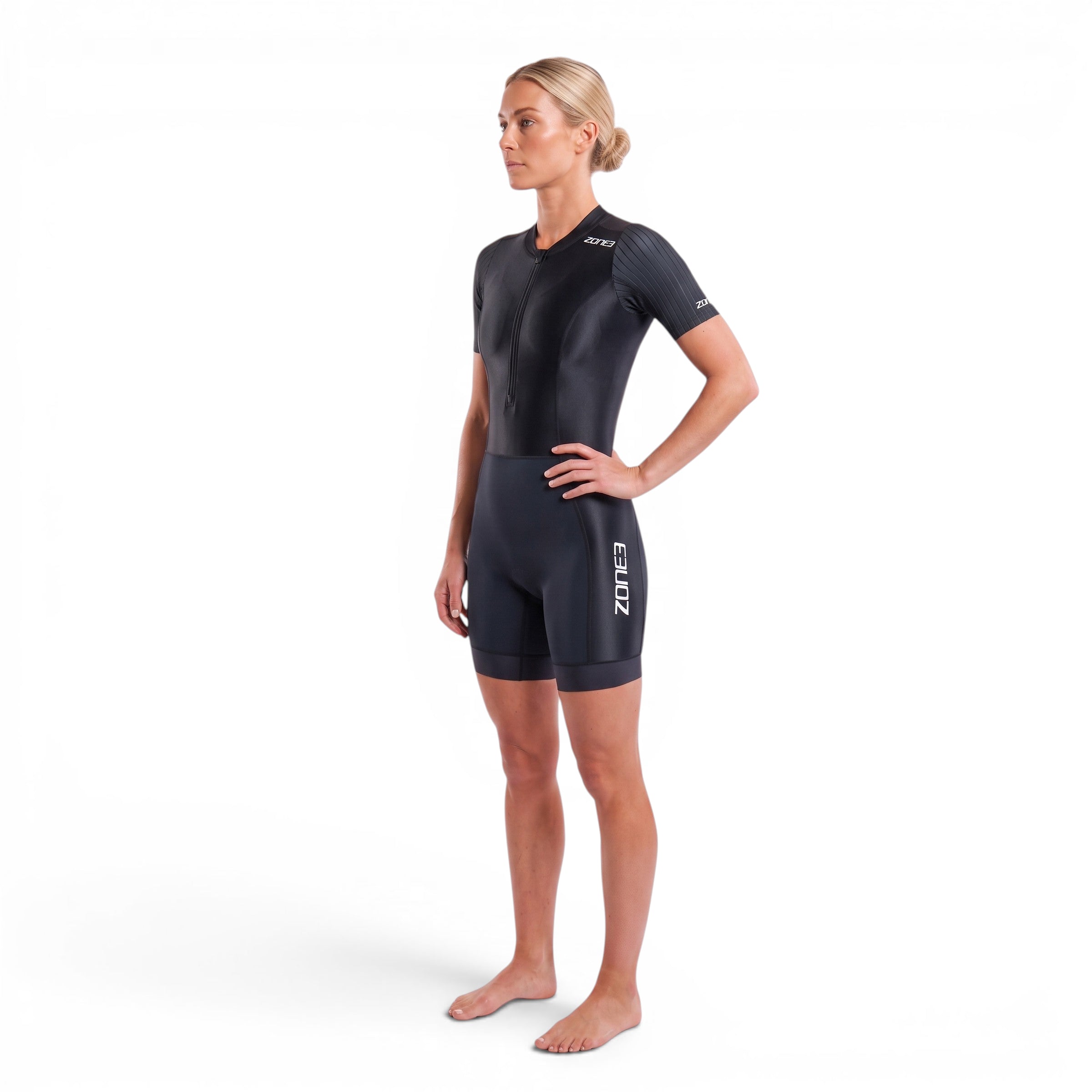 Athlete wearing the Zone3 Black Activate_Short_Sleeve_Trisuit side view on a white background
