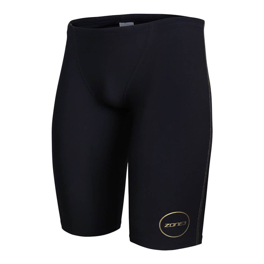 Zone3 MF-X Performance Gold FINA jammers on a white background.