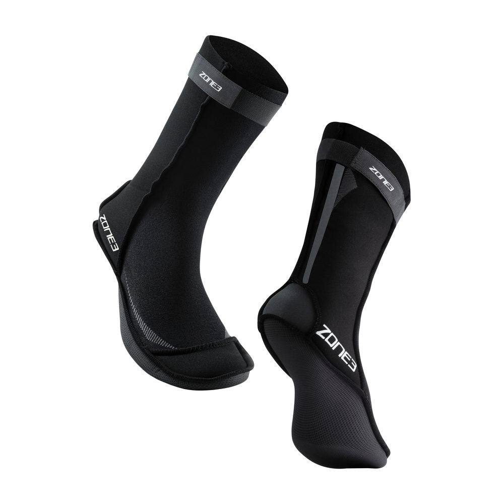 Black neoprene socks with gray top straps and textured grip soles