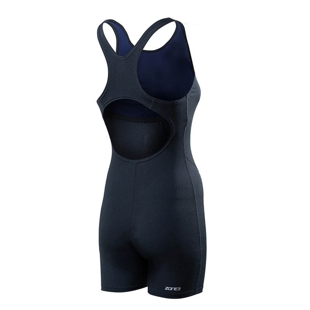 A woman wearing the Zone3 OWS Renew short leg kneeskin swimsuit on a white background.