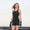A woman wearing the Zone3 OWS Renew short leg kneeskin swimsuit on a white background.