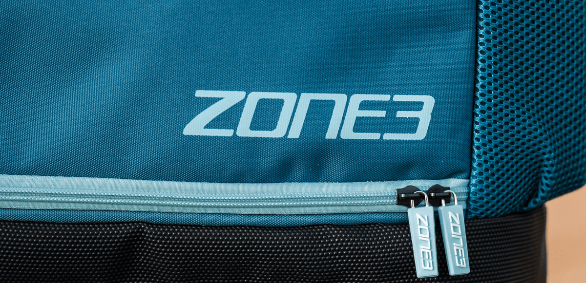 Close up of a teal triathlon transition bag pack