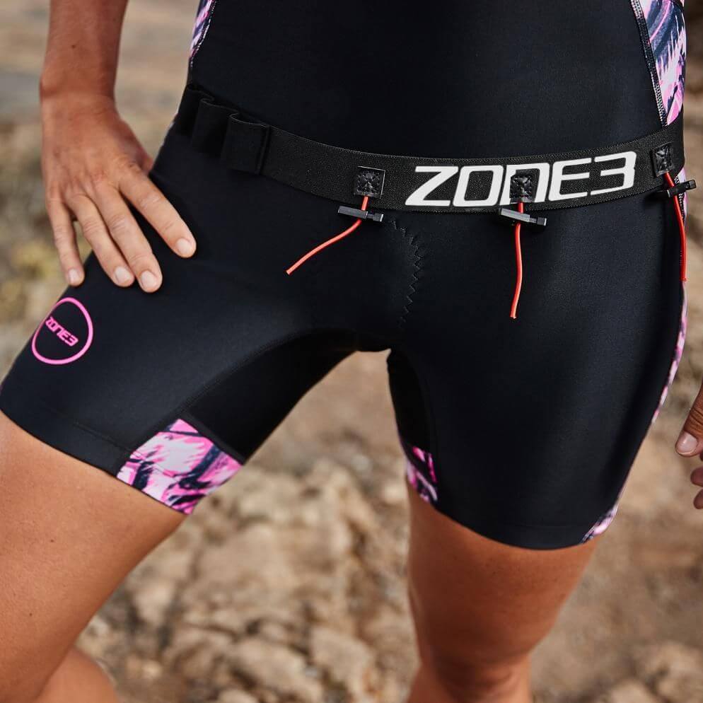 A Zone3 Ultimate race number belt with gel loops on a white background.