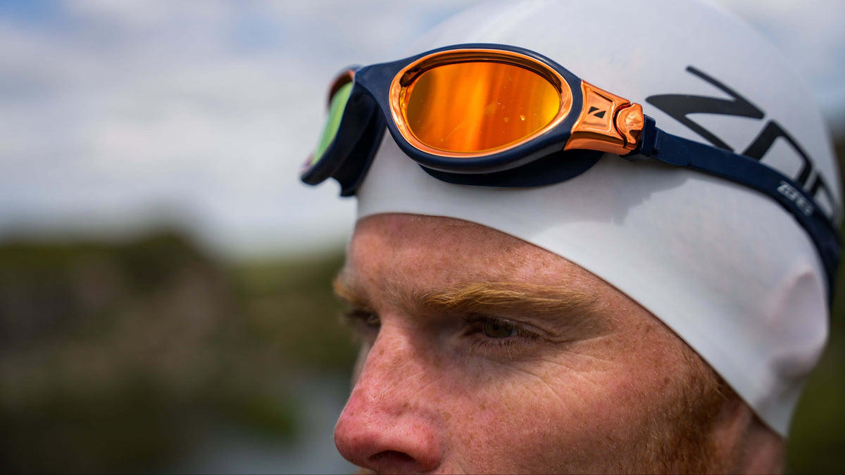 Close up image of an athlete wearing the Navy Copper goggles