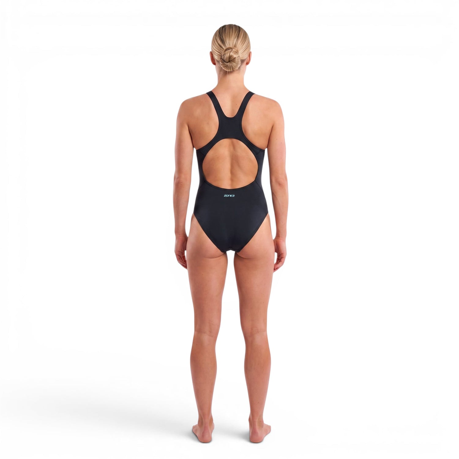 An athlete wearing the Zone3 Black classic swimsuit. back facing on a white background. 