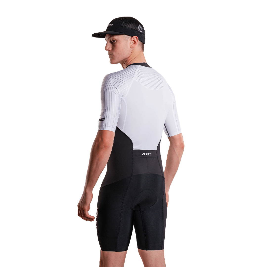 Man wearing Lava Long Distance Full Zip Short Sleeve Trisuit on a white background  