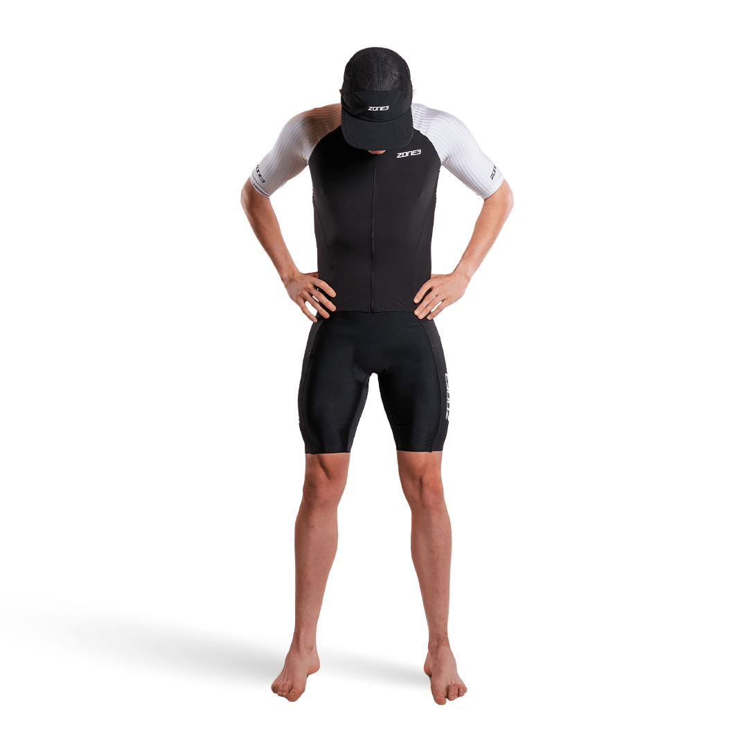 Man wearing Lava Long Distance Full Zip Short Sleeve Trisuit on a white background  