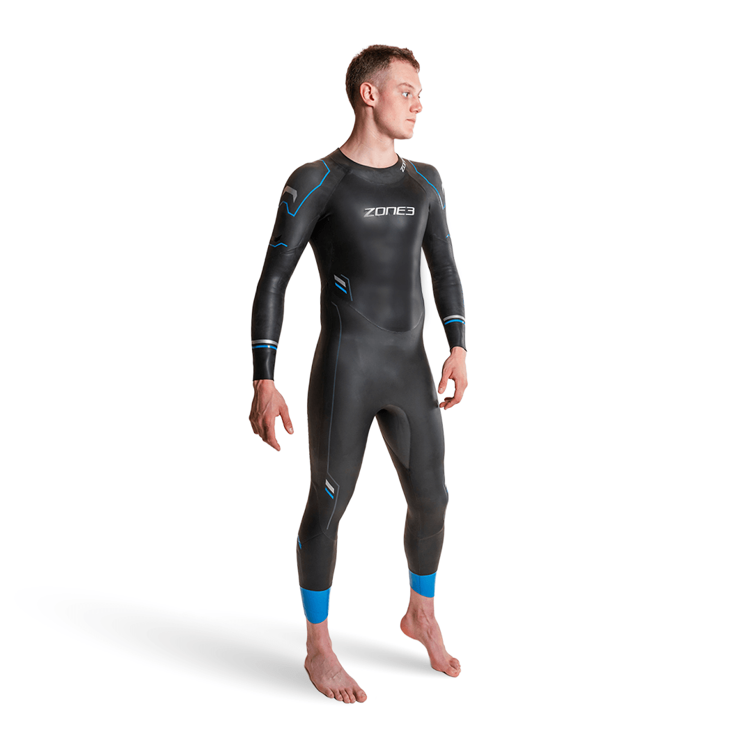 Front view of a man wearing a black Advance wetsuit with blue detailing.